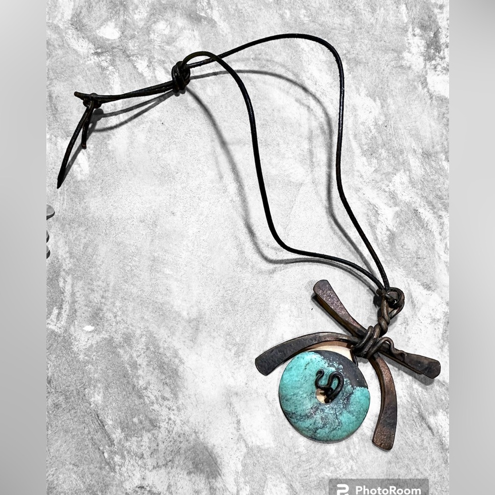 Lg round turquoise stone, ironwork design Chinese design leather cord necklace